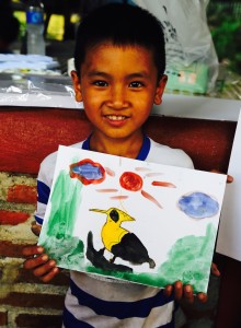 Wanjai with his bird painting