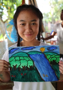 Da with her watercolor landscape painting.