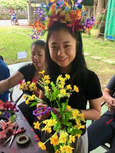 One of our young students making her floral tiara