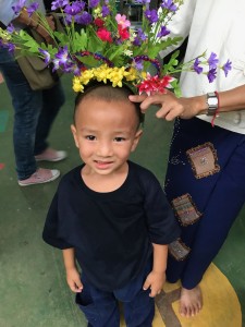 Little Waput tries on one of our tiaras