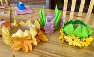 Origami Loy Krathung lanterns made for our "Mae Ping" performance. The real version is a bouquet of orchids incense and candles which are floated down the Mae Ping river every full moon in November