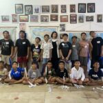 IN – SUZANNE GREGOIRE, GloCAP_s ARTISTIC DIRECTOR WITH THE BOYS IN REHEARSAL